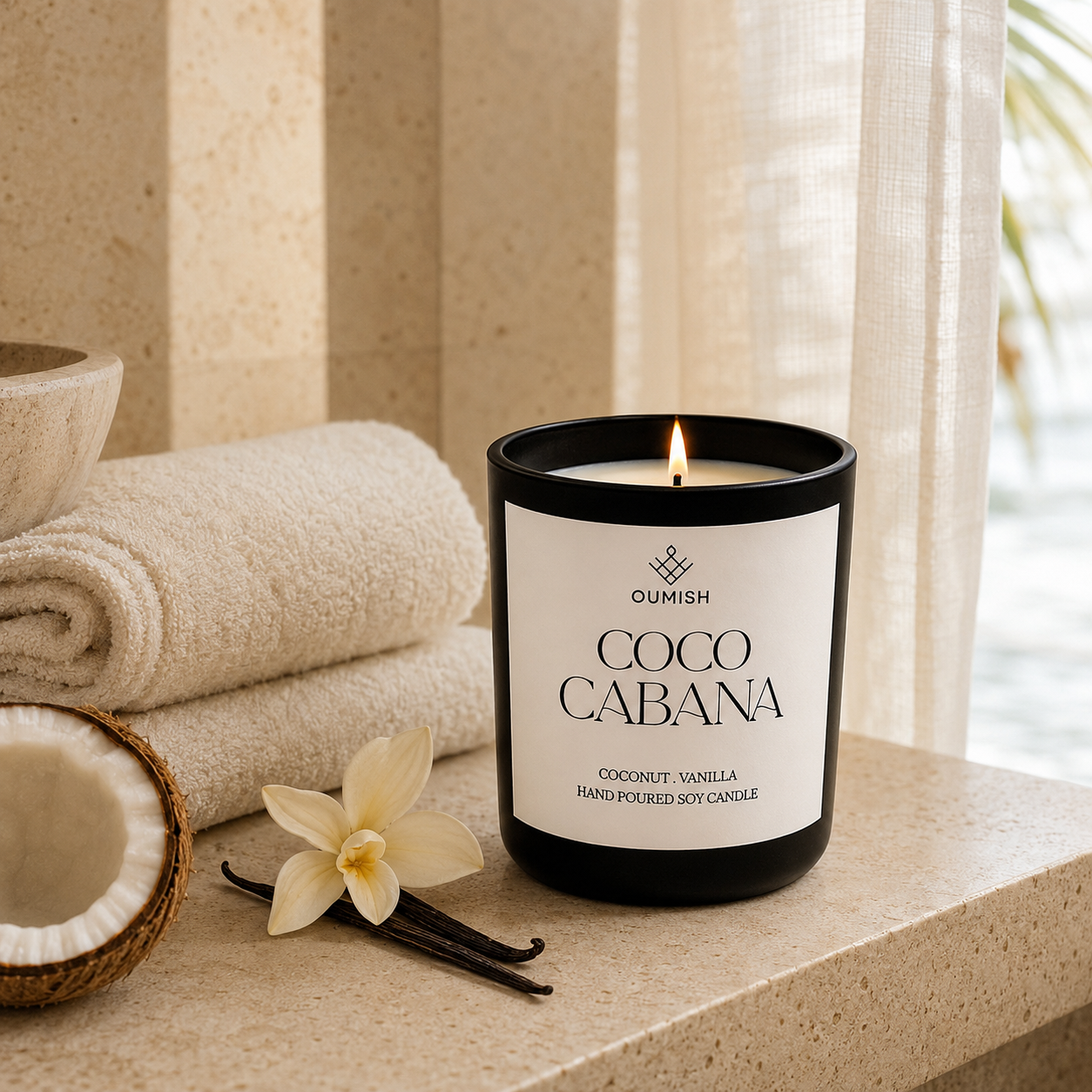 Lit Coco Cabana candle in a serene luxury spa setting creating a warm mood