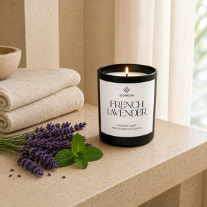 Lit French Lavender candle in a bright luxury spa setting