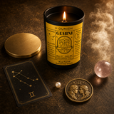 Oumish Gemini zodiac candle ritual flat lay with pearl and Gemini token