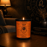 Oumish Leo zodiac candle in a warm luxury astrology lifestyle setting